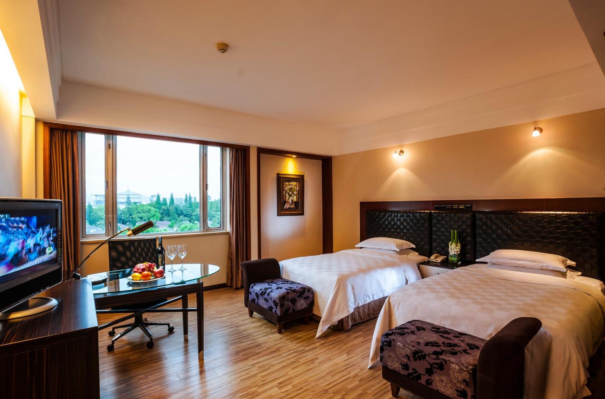 Grand Skylight Gardens Hotel Shanghai Bai Se Road Extérieur photo